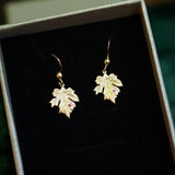 Maple leaf earrings with Ruby